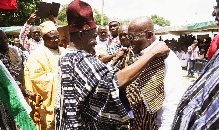 Bulenga Naa presenting a smock to Nana Akufo-Addo on the conferment of 'Chief of Patience' title